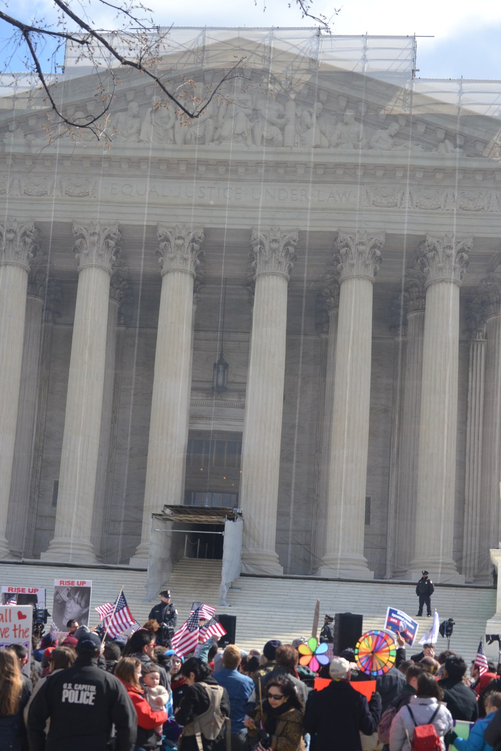 Lots of people in front of the Supreme Court (note that the building is being renovated so there is a false facade)